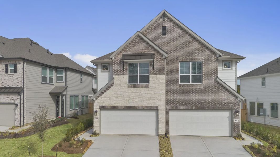 Front exterior of a new home in Woodforest, Montgomery, TX, highlighting curb appeal (Image 20).