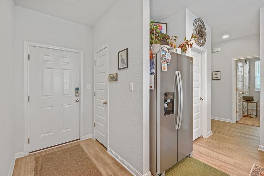 Furnished interior view inside a new home in Stallion Run, Buda (Image 28).