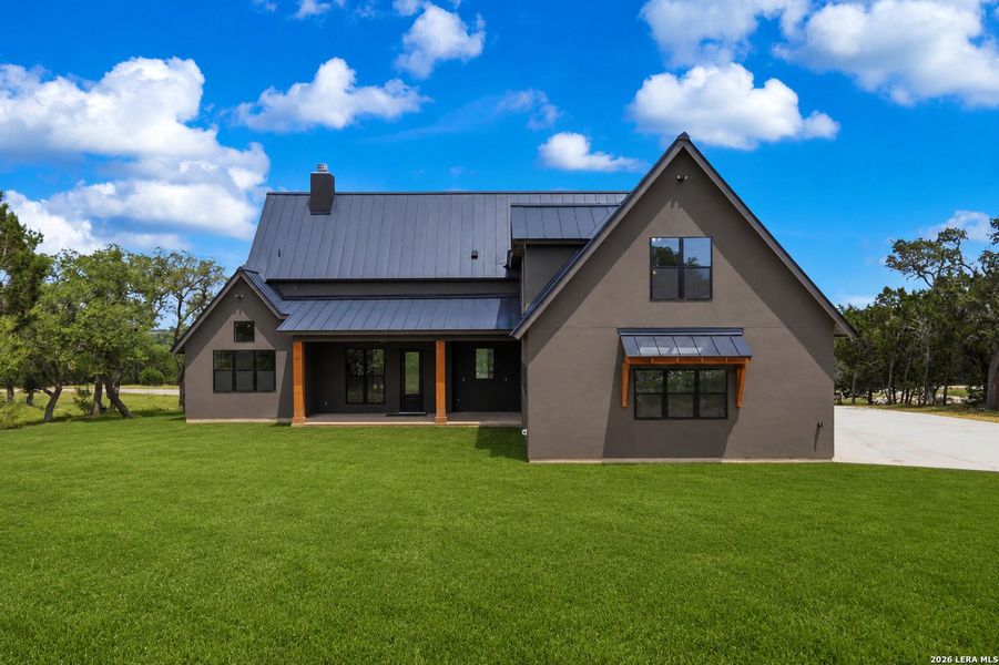 Front exterior of a new home in , Spring Branch, TX, highlighting curb appeal (Image 29).