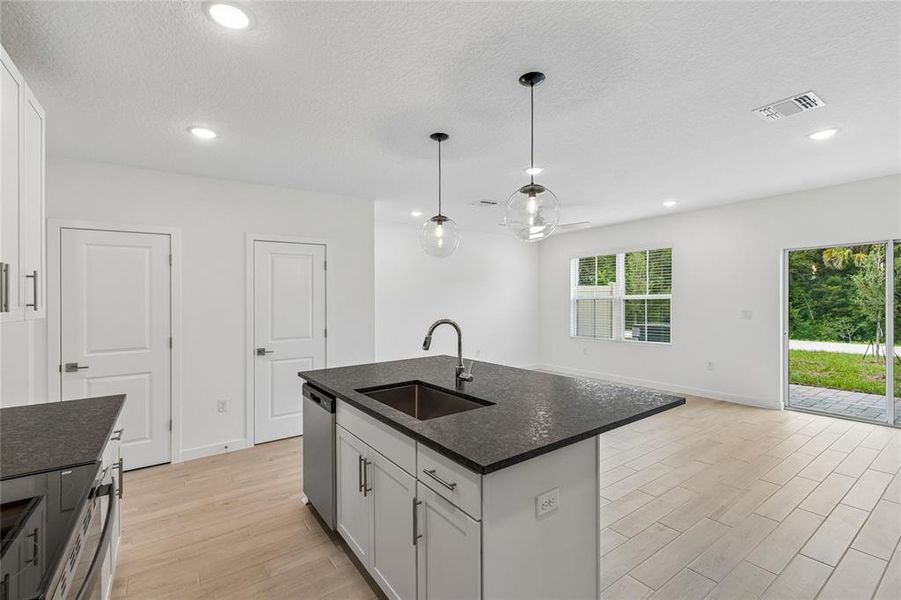 Furnished interior view inside a new home in Aspire at Canter Creek, Davenport (Image 7).