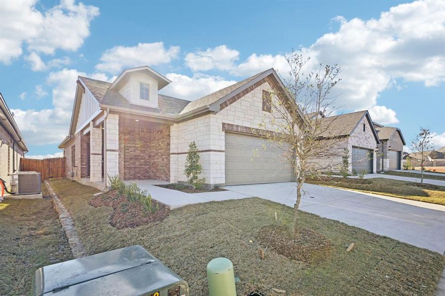 Front exterior of a new home in Eastridge - Spring Series, McKinney, TX, highlighting curb appeal (Image 22).