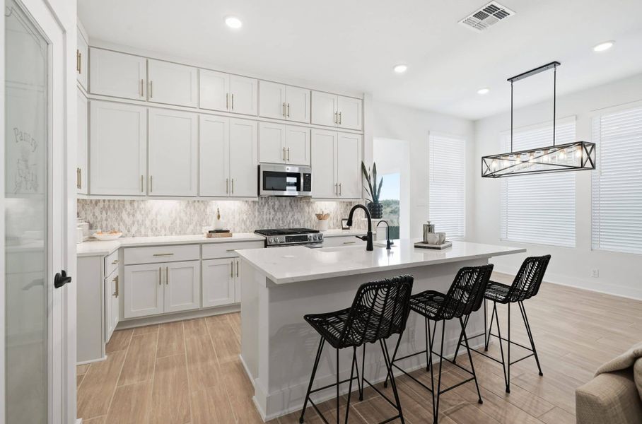 Furnished interior view inside a new home in Centero at Stone Oak, San Antonio (Image 6).