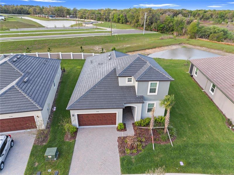 Front exterior of a new home in , San Antonio, FL, highlighting curb appeal (Image 2). Front exterior of a new home in , San Antonio, FL, highlighting curb appeal (Image 2).