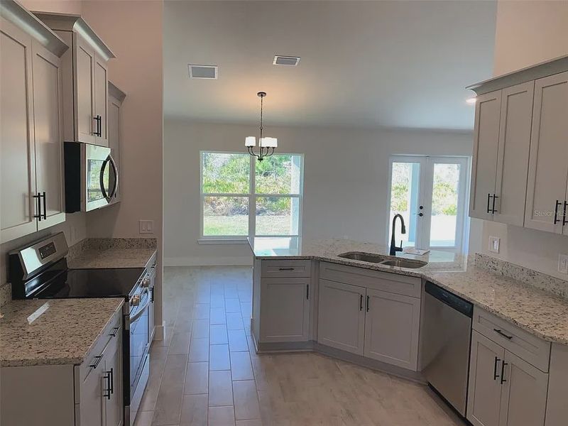 Furnished interior view inside a new home in Gulf Cove, Port Charlotte (Image 6).