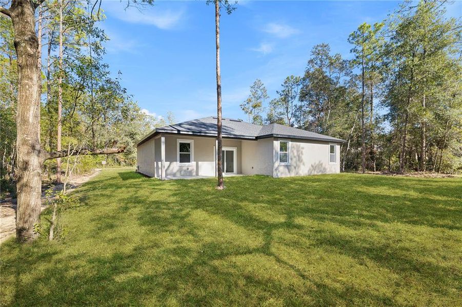 Exterior details and patio area of a home in , Citrus Springs (Image 3).