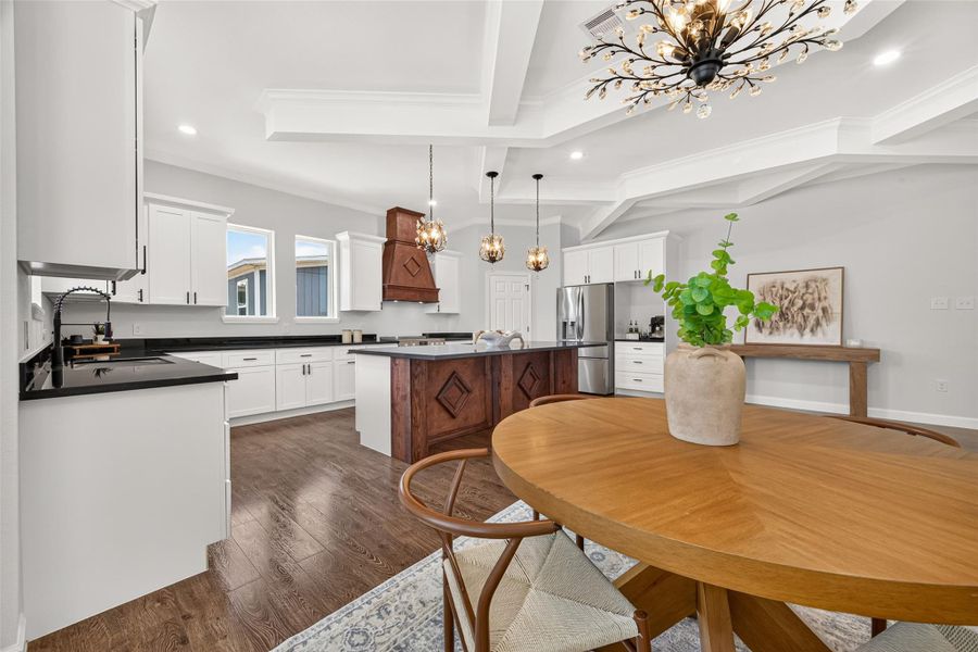 Spacious dining area seamlessly connected to the kitchen and living space.