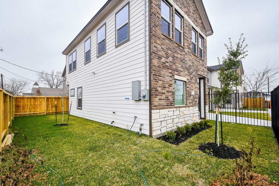 Front exterior of a new home in , Houston, TX, highlighting curb appeal (Image 19).