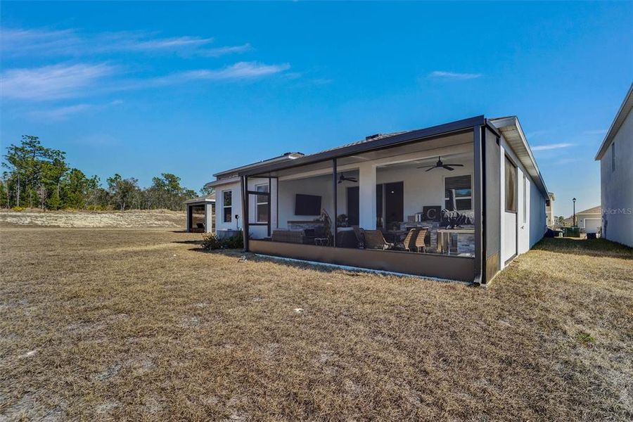 Exterior details and patio area of a home in Waterford, Brooksville (Image 27).