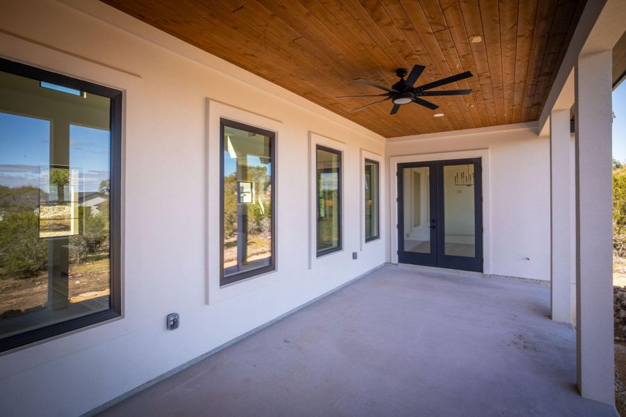 View of patio / terrace with a ceiling fan and french doors