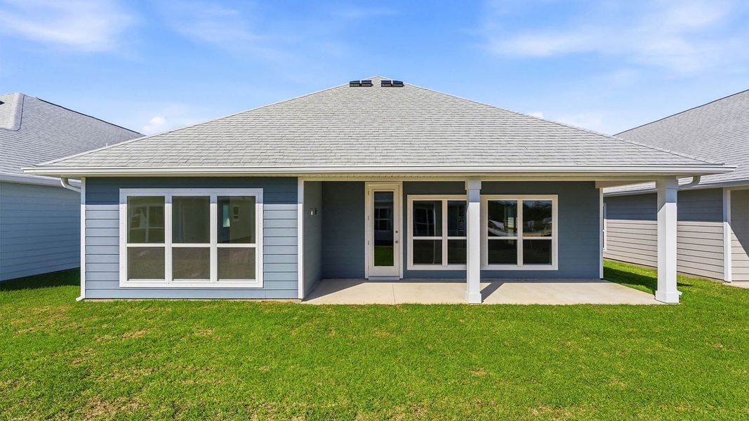 Exterior details and patio area of a home in WindMark Beach, Port Saint Joe (Image 3).