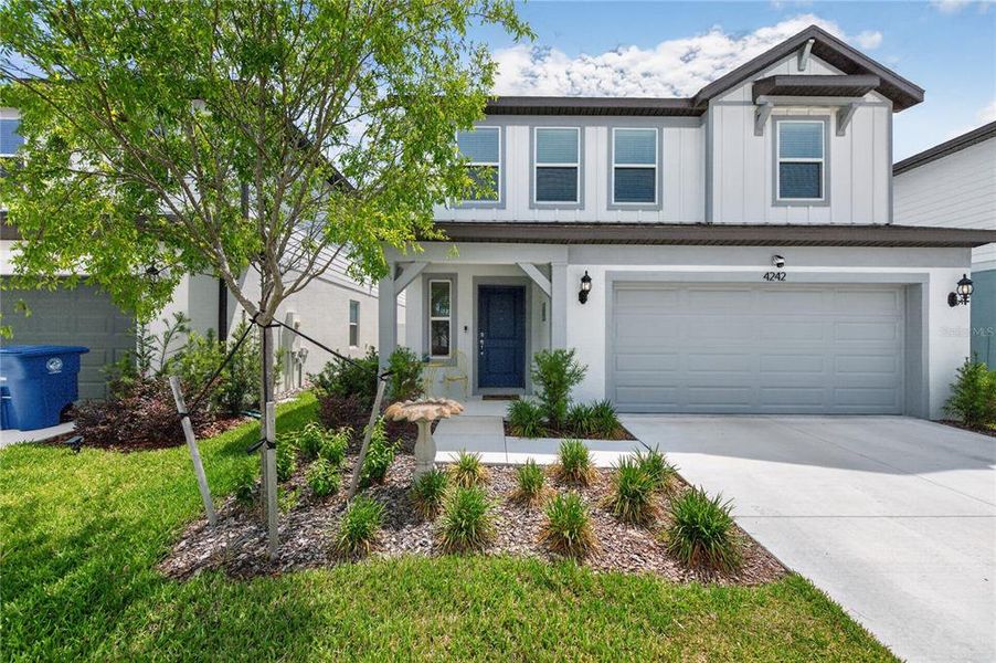 Front exterior of a new home in Caldera, Spring Hill, FL, highlighting curb appeal (Image 27).
