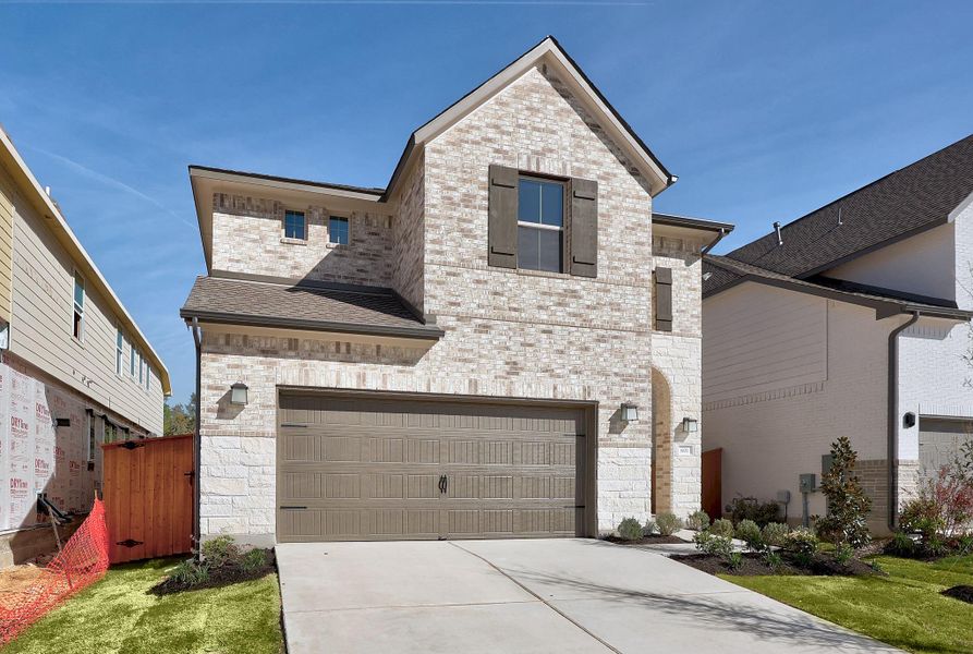 Front exterior of a new home in Parmer Ranch, Georgetown, TX, highlighting curb appeal (Image 19).