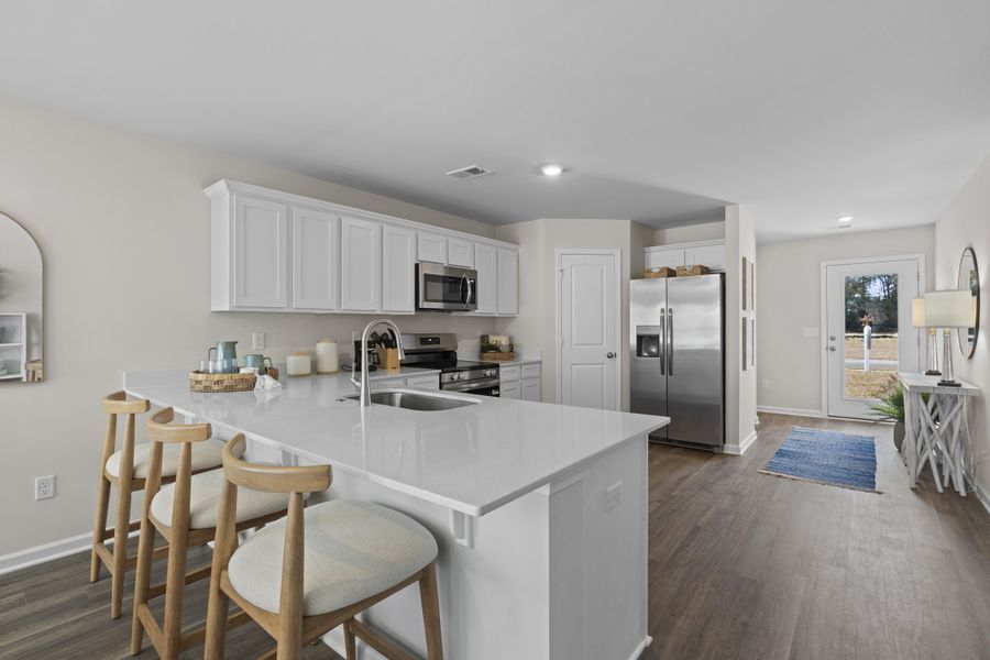 Representative furnished interior of a home built from the Alder Select N by McGuinn Homes in Broadway Lake, Anderson (Image 7).
