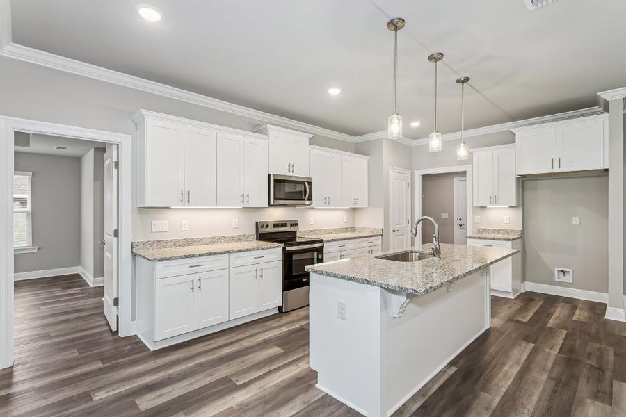 Representative furnished interior of a home built from the The Sapphire by Herbst Homes in Walther Reserve, Milton (Image 96).