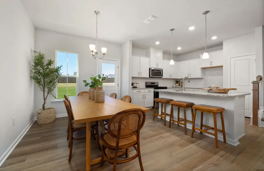 Furnished interior view inside a new home in Saunders Farm, Willow Spring (Image 9).