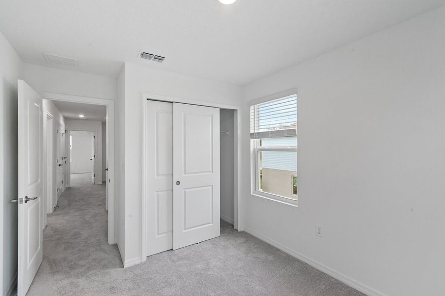 Spacious, unfurnished interior of a new home in Waterstone Townhomes, Groveland (Image 21). Spacious, unfurnished interior of a new home in Waterstone Townhomes, Groveland (Image 21).
