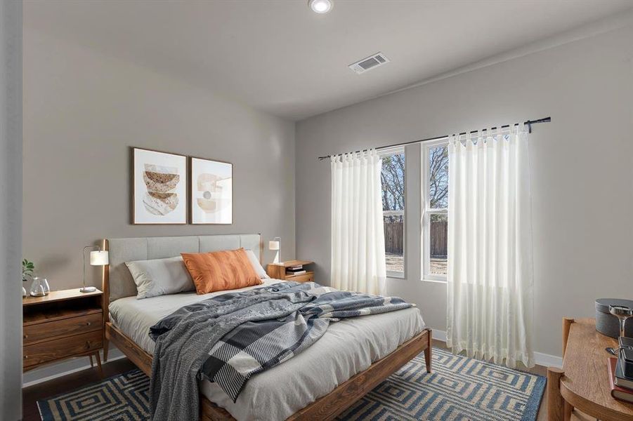 Bedroom with wood-type flooring