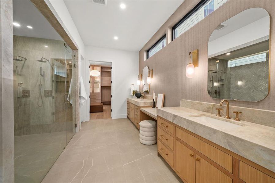Full bath with a stall shower, two vanities, light tile patterned floors, and recessed lighting Full bath with a stall shower, two vanities, light tile patterned floors, and recessed lighting