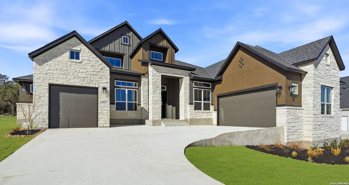 Front exterior of a new home in Heimer Estates at Garden Ridge, San Antonio, TX, highlighting curb appeal (Image 27).