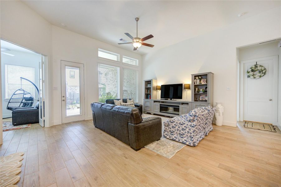 Large windows fill the room with light while providing views of the backyard. Large windows fill the room with light while providing views of the backyard.
