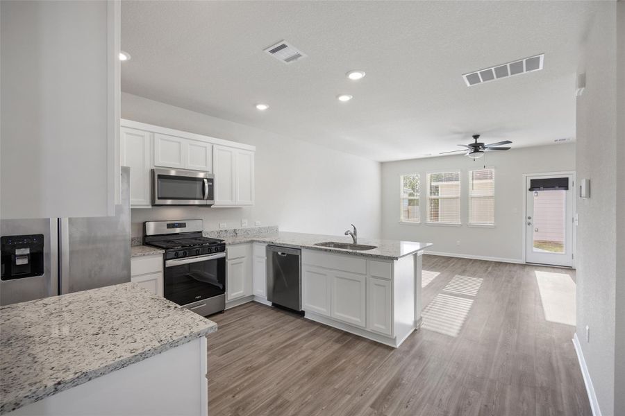 Furnished interior view inside a new home in Avery Centre, Round Rock (Image 12).