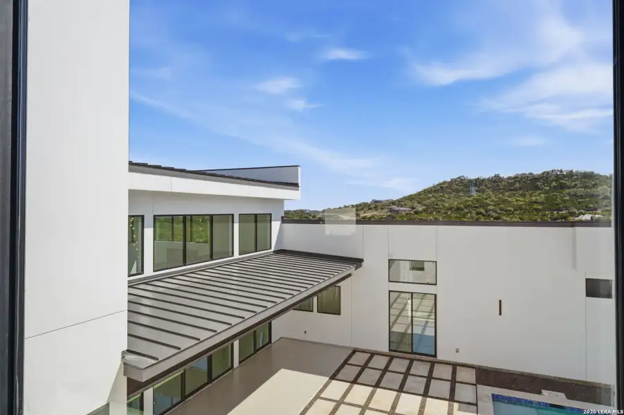 Exterior details and patio area of a home in , San Antonio (Image 43).