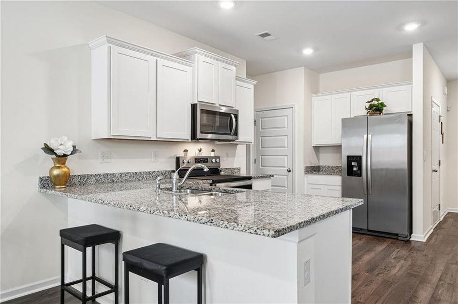 Furnished interior view inside a new home in Champion's Run, Lithonia (Image 8).