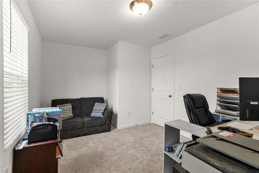 Furnished interior view inside a new home in Alder Park, Conyers (Image 10).