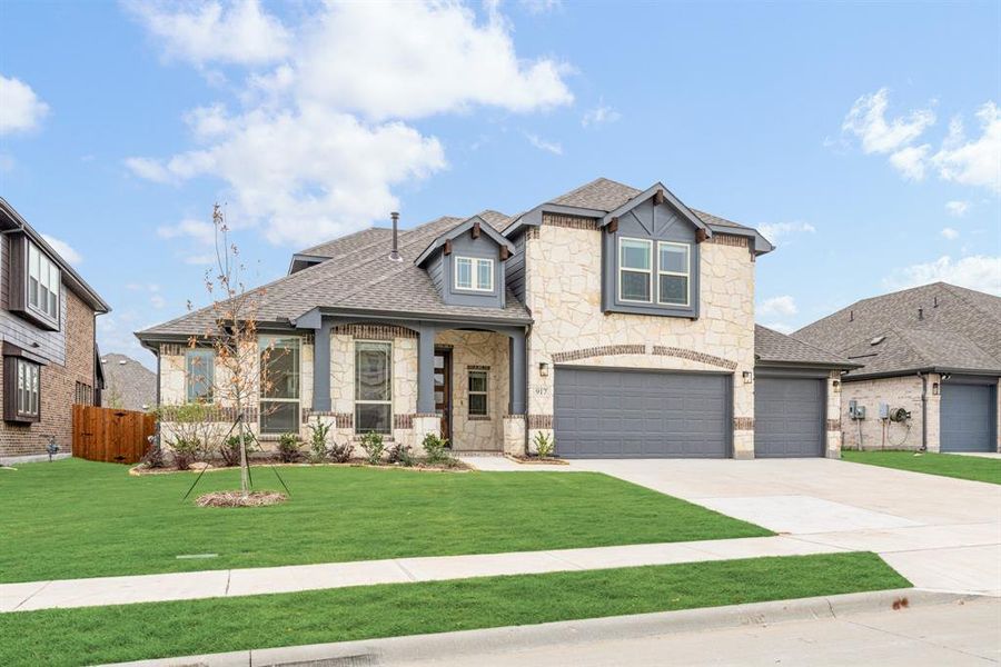 Front exterior of a new home in West Crossing, Anna, TX, highlighting curb appeal (Image 2). Front exterior of a new home in West Crossing, Anna, TX, highlighting curb appeal (Image 2).