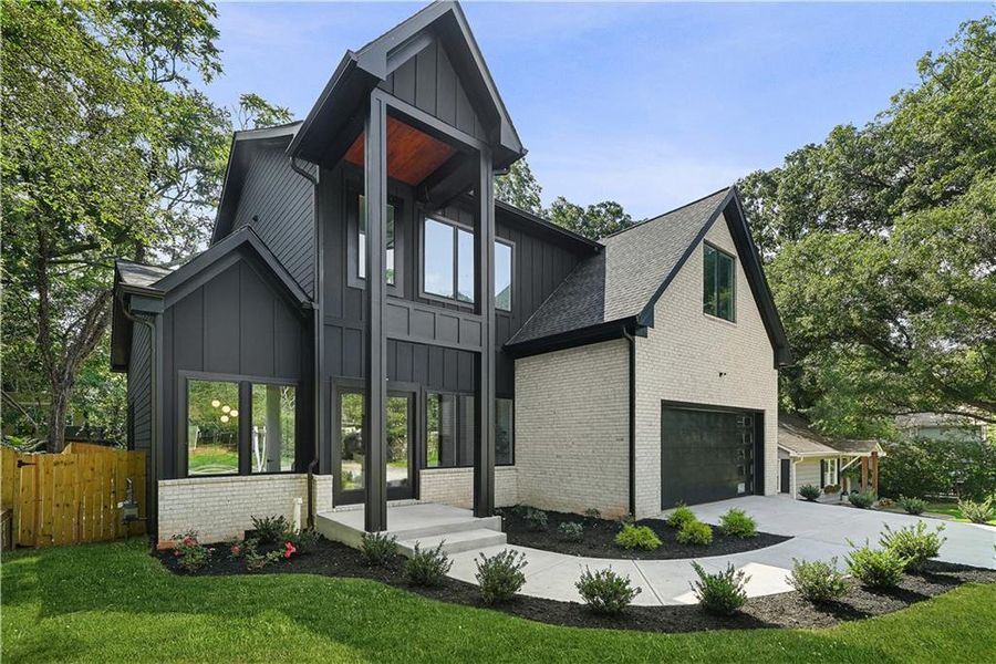 Front exterior of a new home in , Scottdale, GA, highlighting curb appeal (Image 26). Front exterior of a new home in , Scottdale, GA, highlighting curb appeal (Image 26).