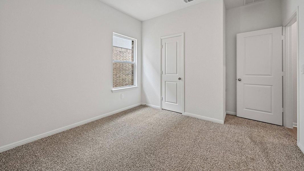 Spacious, unfurnished interior of a new home in Bar W Ranch, Leander (Image 35).