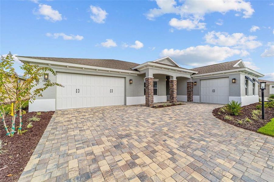 Front exterior of a new home in , Ocala, FL, highlighting curb appeal (Image 24).