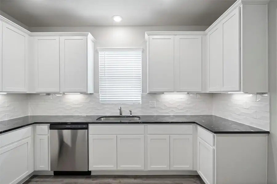 Furnished interior view inside a new home in Sunterra, Katy (Image 7).