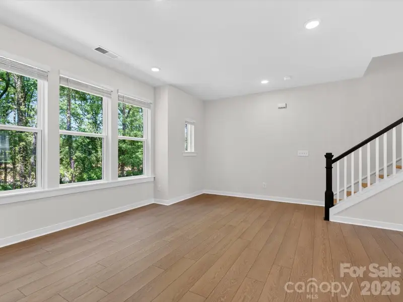 Spacious, unfurnished interior of a new home in Central Living at Craig, Charlotte (Image 15). Spacious, unfurnished interior of a new home in Central Living at Craig, Charlotte (Image 15).