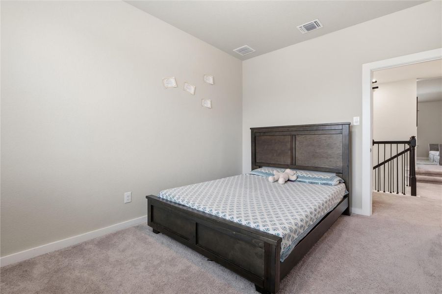 Furnished interior view inside a new home in University Heights, Round Rock (Image 19).