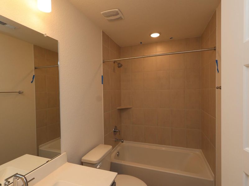 Furnished interior view inside a new home in Sorella, Tomball (Image 11).