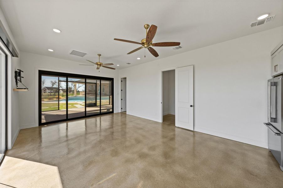 Spare room featuring recessed lighting, visible vents, and ceiling fan