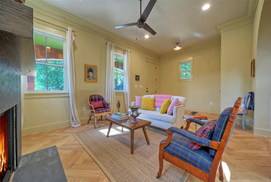 Expansive windows throughout the home create sunlit spaces.