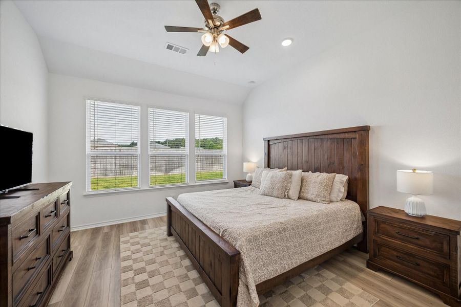 Relaxing owner's retreat with ample natural light and generous space.