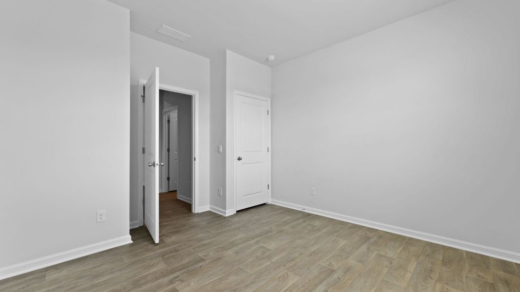 Spacious, unfurnished interior of a new home in Pine Hills at Cane Bay, Summerville (Image 20).