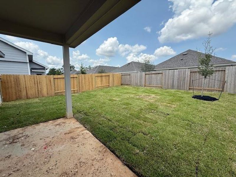 Front exterior of a new home in Cliffstone Hills, Conroe, TX, highlighting curb appeal (Image 17).
