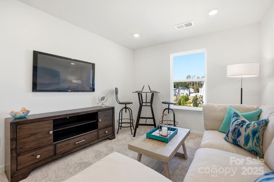 Furnished interior view inside a new home in Bellina, York (Image 28).