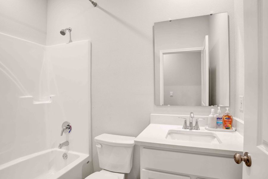 Furnished interior view inside a new home in Bellview Pointe, Pensacola (Image 16).