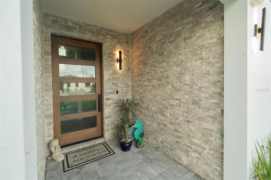Exterior details and patio area of a home in , Madeira Beach (Image 34).