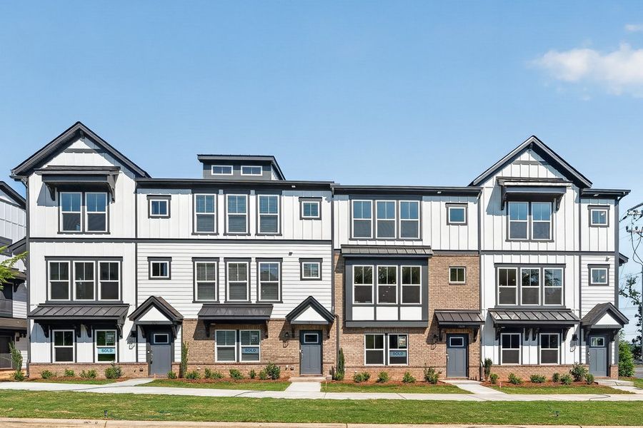 Front exterior of a new home in Senata at Research Park, Charlotte, NC, highlighting curb appeal (Image 2). Front exterior of a new home in Senata at Research Park, Charlotte, NC, highlighting curb appeal (Image 2).