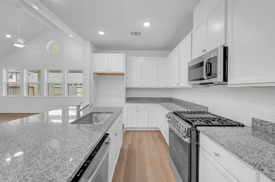 Stylish kitchen with granite counters Stylish kitchen with granite counters