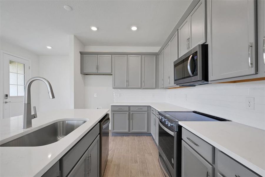 Furnished interior view inside a new home in Seaire, Parrish (Image 6).