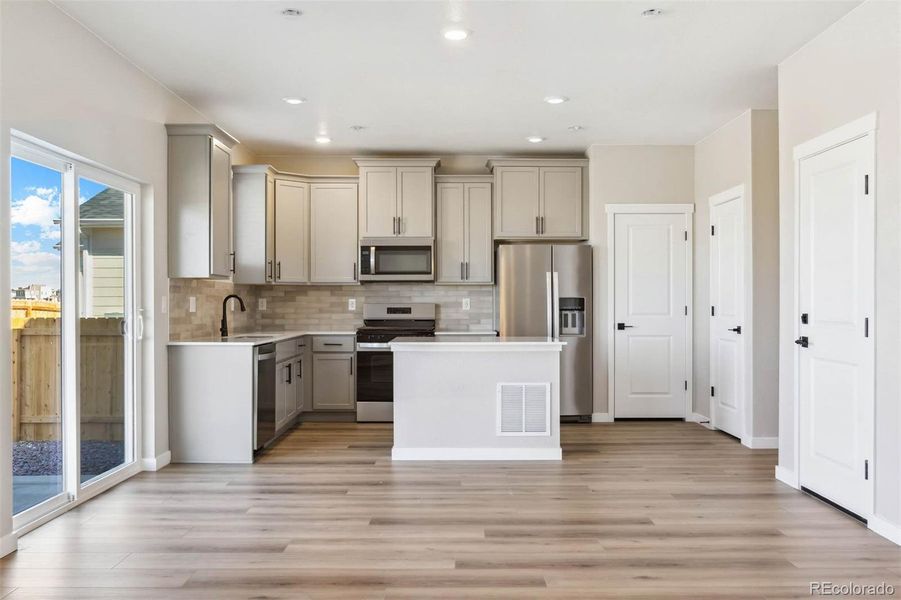 Furnished interior view inside a new home in Second Creek Farm, Commerce City (Image 5).