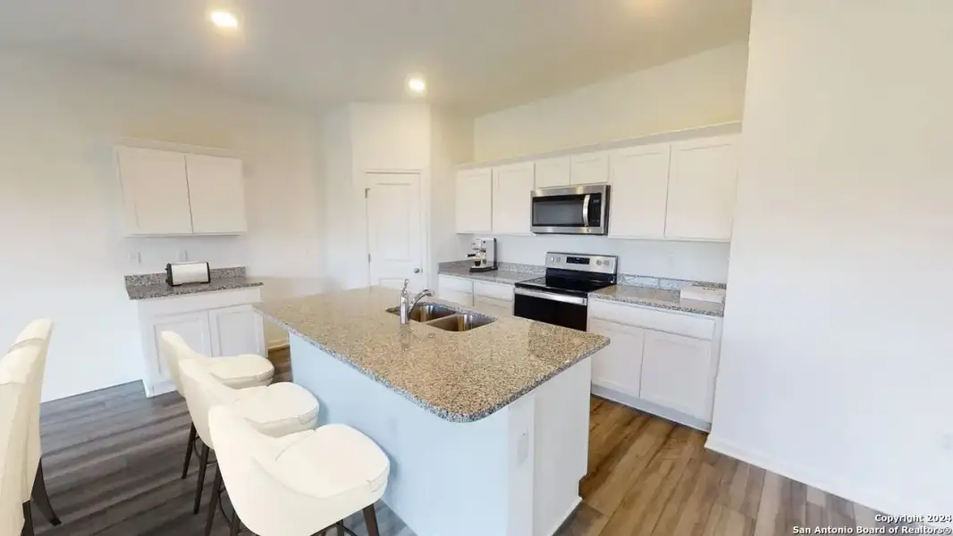 Furnished interior view inside a new home in Roosevelt Heights, San Antonio (Image 9).