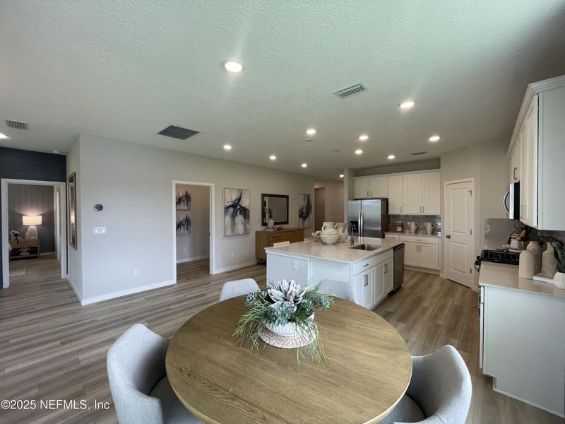 Furnished interior view inside a new home in The Magnolia Series at Reserve East, Flagler Beach (Image 6). Furnished interior view inside a new home in The Magnolia Series at Reserve East, Flagler Beach (Image 6).